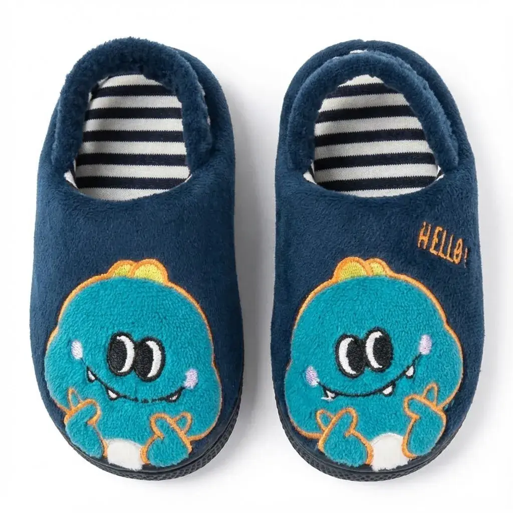Cartoon Monster Indoor Slippers – Top View Top view of kids indoor slippers featuring cartoon monster face