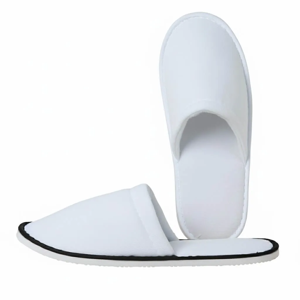 UT-DS1001 White Terry Hotel Spa Slippers Side Profile terry hotel and spa slippers side profile showing lightweight disposable structure and soft fabric