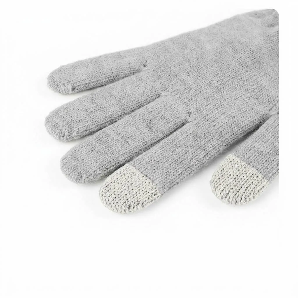 Smart Touchscreen Winter Gloves Fingertips Close up of the conductive yarn on the fingertips of the grey smart touchscreen winter gloves.
