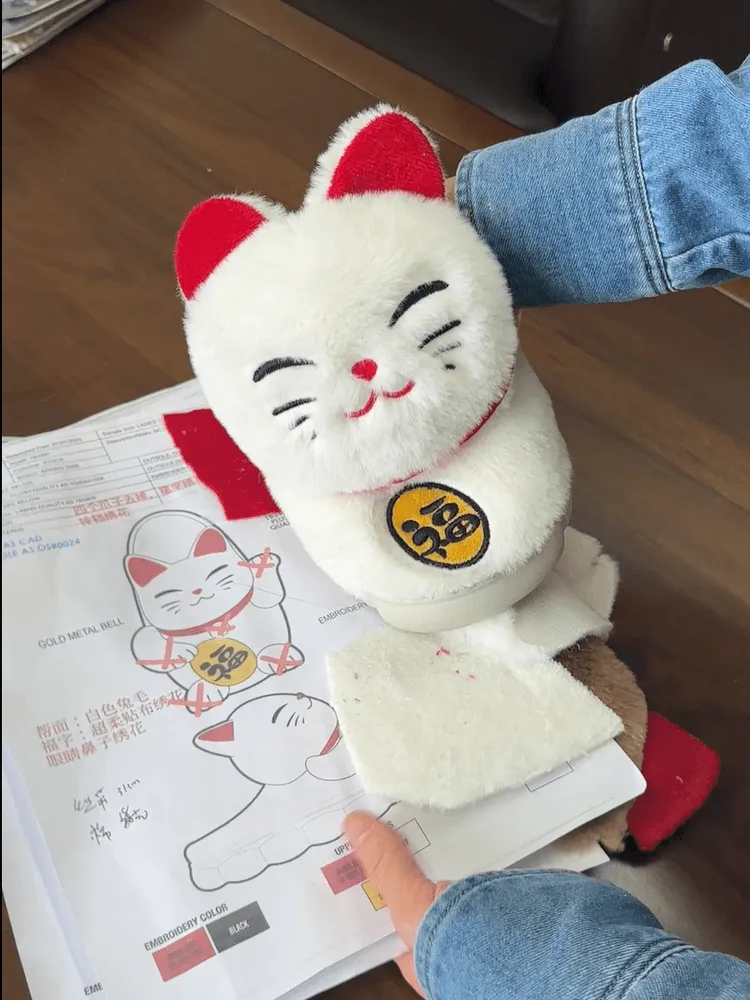 Custom cat slipper sample compared with its design sheet and material details