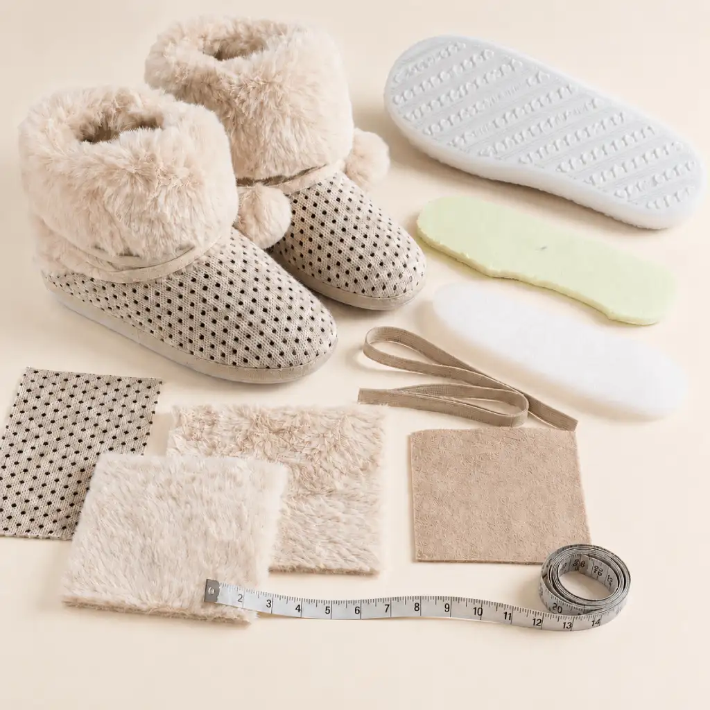 Plush-lined slipper boots with upper fabric lining cushioning outsole and measuring references