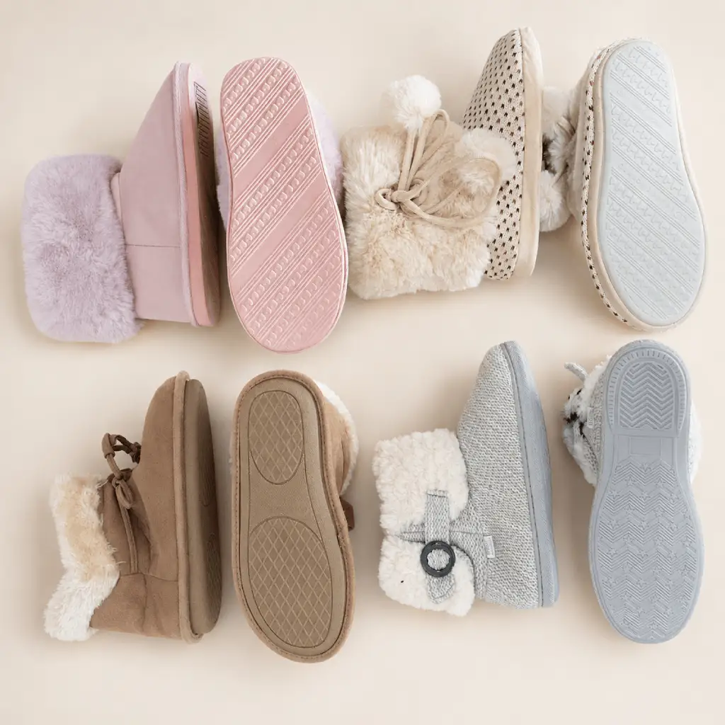 Slipper boots shown from side and outsole views for tread thickness and construction review